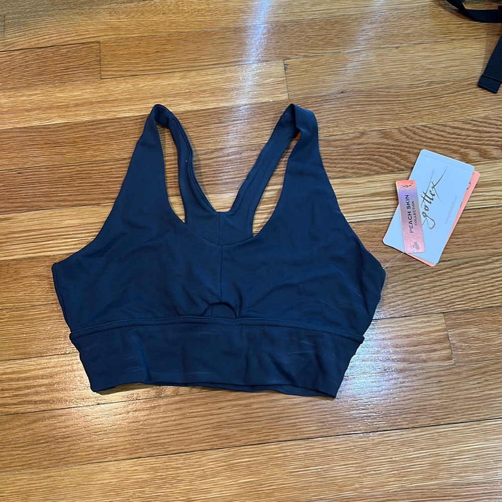 Sports bra. by X by Gottex. color- caviar. size small